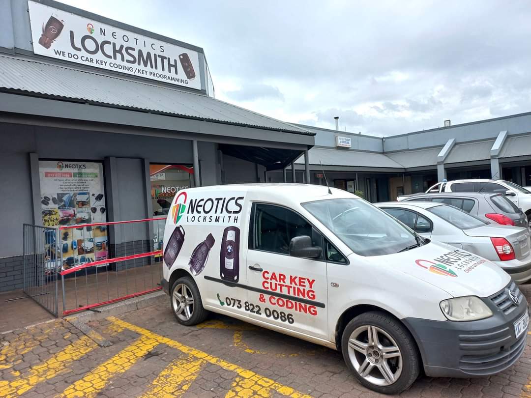 Neotics Locksmith shop front with branded mobile locksmith van
